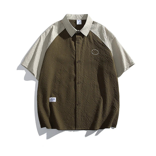 Brown shirt with patterned sleeves on a white background, featuring Basefly branding.