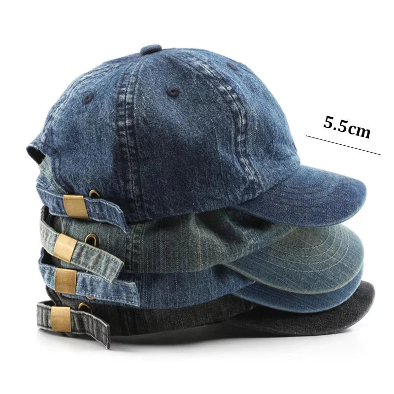 Stack of denim baseball caps with leather straps on a white background, featuring the brand 'FanXuan'.