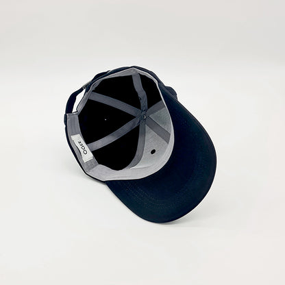 Navy blue cap with gray interior on a white background