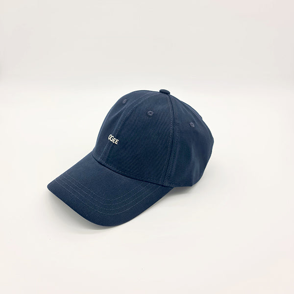 Navy blue cap with a brand logo on a white background