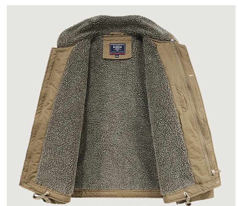 A tan quilted jacket with a thick gray and white sherpa fleece lining, shown open against a light gray background.