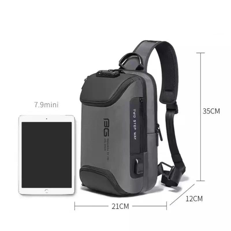 Gray sling bag with measurements and an iPad for scale on a white background