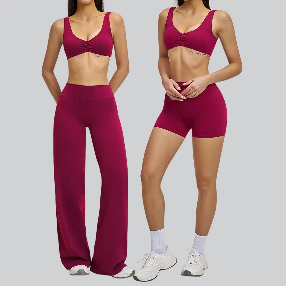 Two outfits featuring a pink sports bra and leggings on a plain background