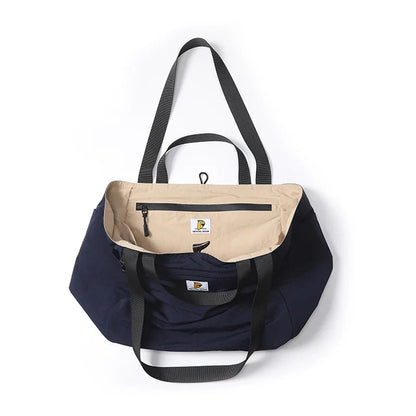Two bags, one navy and one beige with a visible brand logo, on a white background.