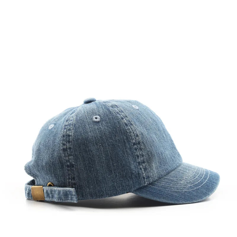 Blue denim cap on a white background with text