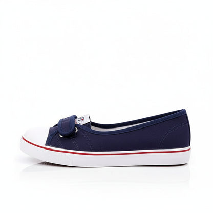 Navy blue shoes with white soles on a white surface