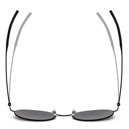 Sunglasses with elastic mirror legs on a white background