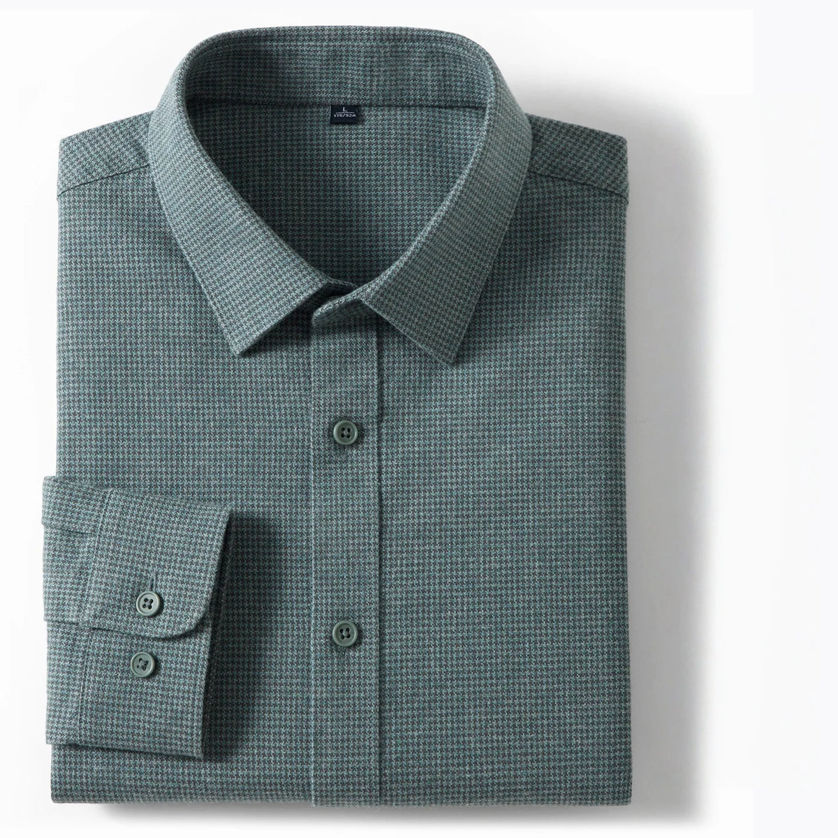 A folded long-sleeve button-down dress shirt in a muted blue-gray houndstooth pattern, featuring a classic collar and a buttoned cuff, displayed on a clean white background.