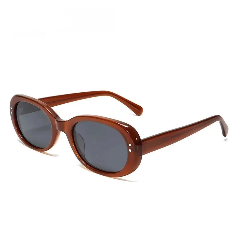 Brown sunglasses with dark lenses on a white background, branded 'Starlight'.