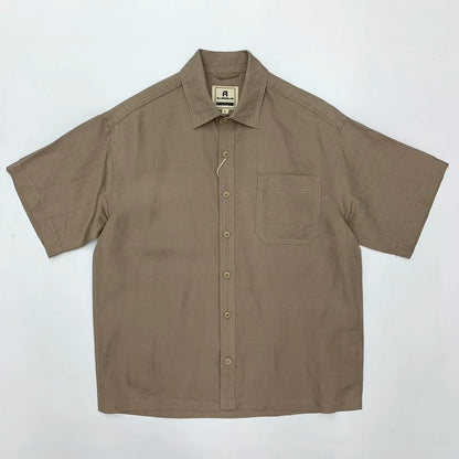 Brown short-sleeve shirt with a collar on a white background