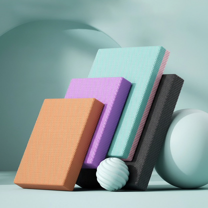 Somatosensory balance pads in various colors on a light blue background