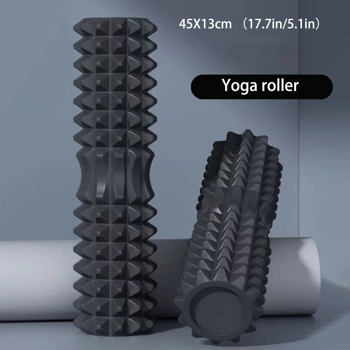 Yoga roller with textured design on a gray background