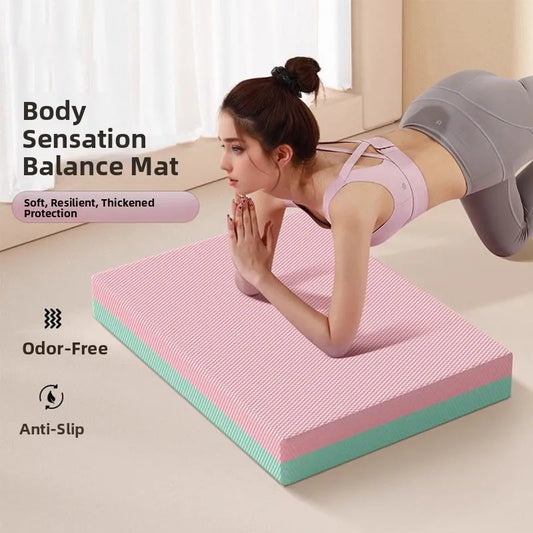 Woman using a pink and green balance mat with text highlighting features on a light background