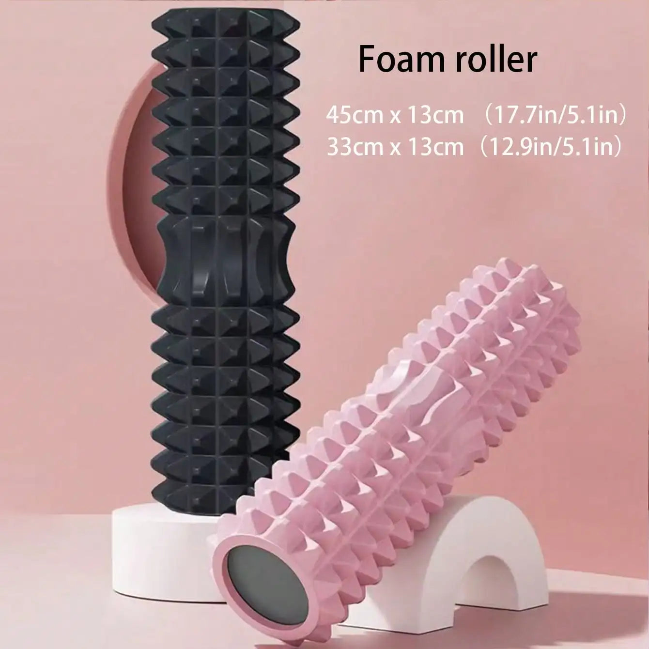 Two foam rollers, one black and one pink, on a pink background with text indicating dimensions.