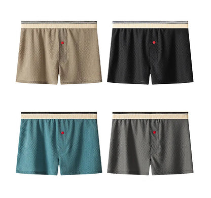 Four pairs of men's boxer briefs in different colors on a white background.