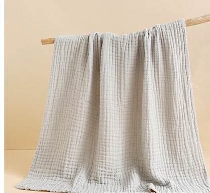 The Airy Muse Muslin Baby Throw: Your Year-Round Sleep Sanctuary