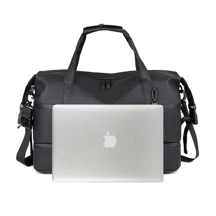 Gray black travel sports bag with a laptop inside on a white background
