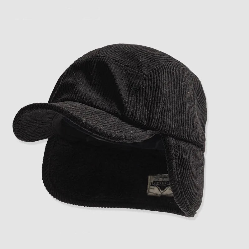 Black knitted cap with ear flaps on a light gray background, featuring the brand 'BANLEI'.