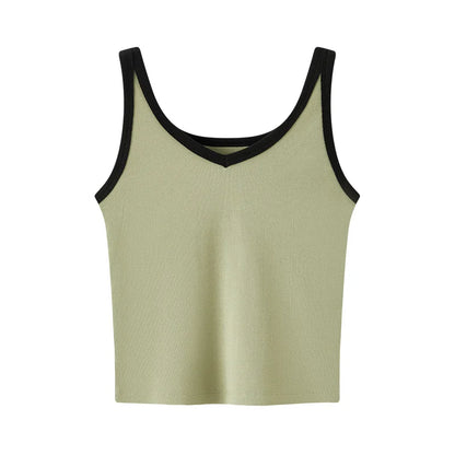 Light green tank top with black trim on a white background