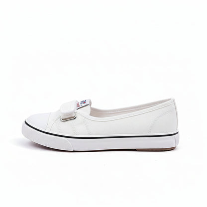 White sneakers with a brand logo on a white surface.
