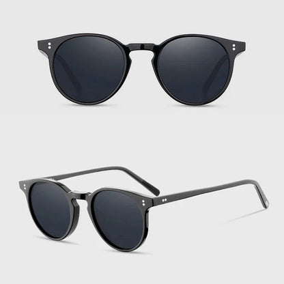 Two pairs of black sunglasses on a light gray background
