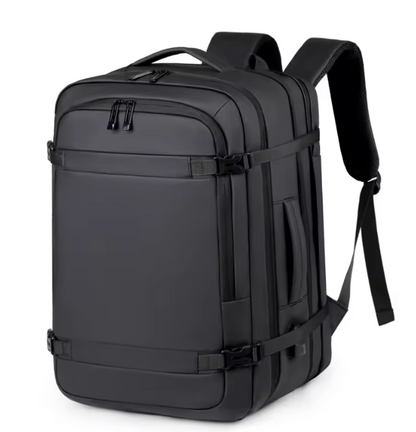 Black backpack with multiple straps on a white background