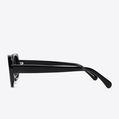 Black sunglasses with a brand logo on a white background