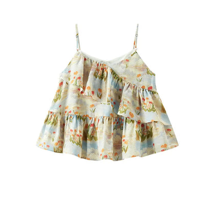 Floral dress with ruffled layers on a white background