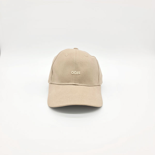 Beige cap with 'OGEE' logo on a white background